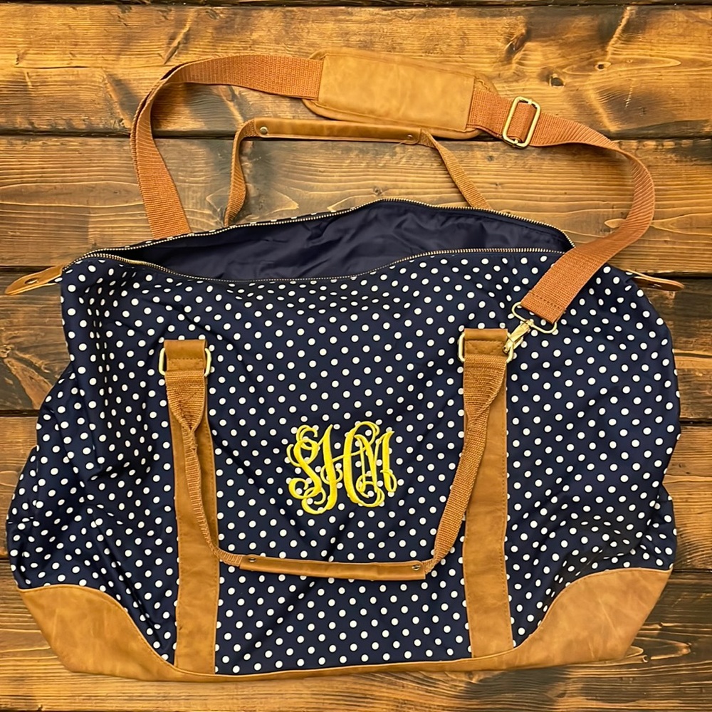 Monogrammed Viv & Lou duffle. Navy and white polka dot vegan brown leather trim.